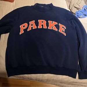Denim blue Parke Turtleneck Sweater with Orange Lettering